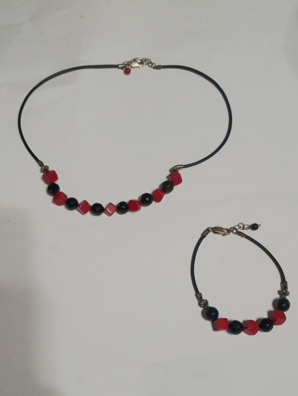 Black And Red Stone Beaded On Sterling Clasps And Accents On Cord Aet